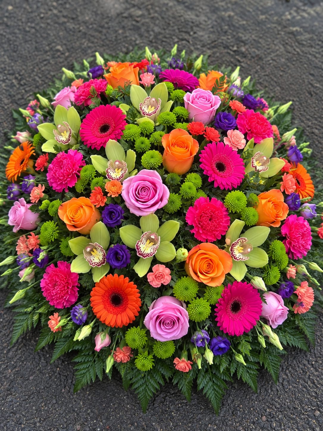 Coussin de deuil Vitrail, multicolore, fuchsia, orange, vert — Camelia et ses fleurs